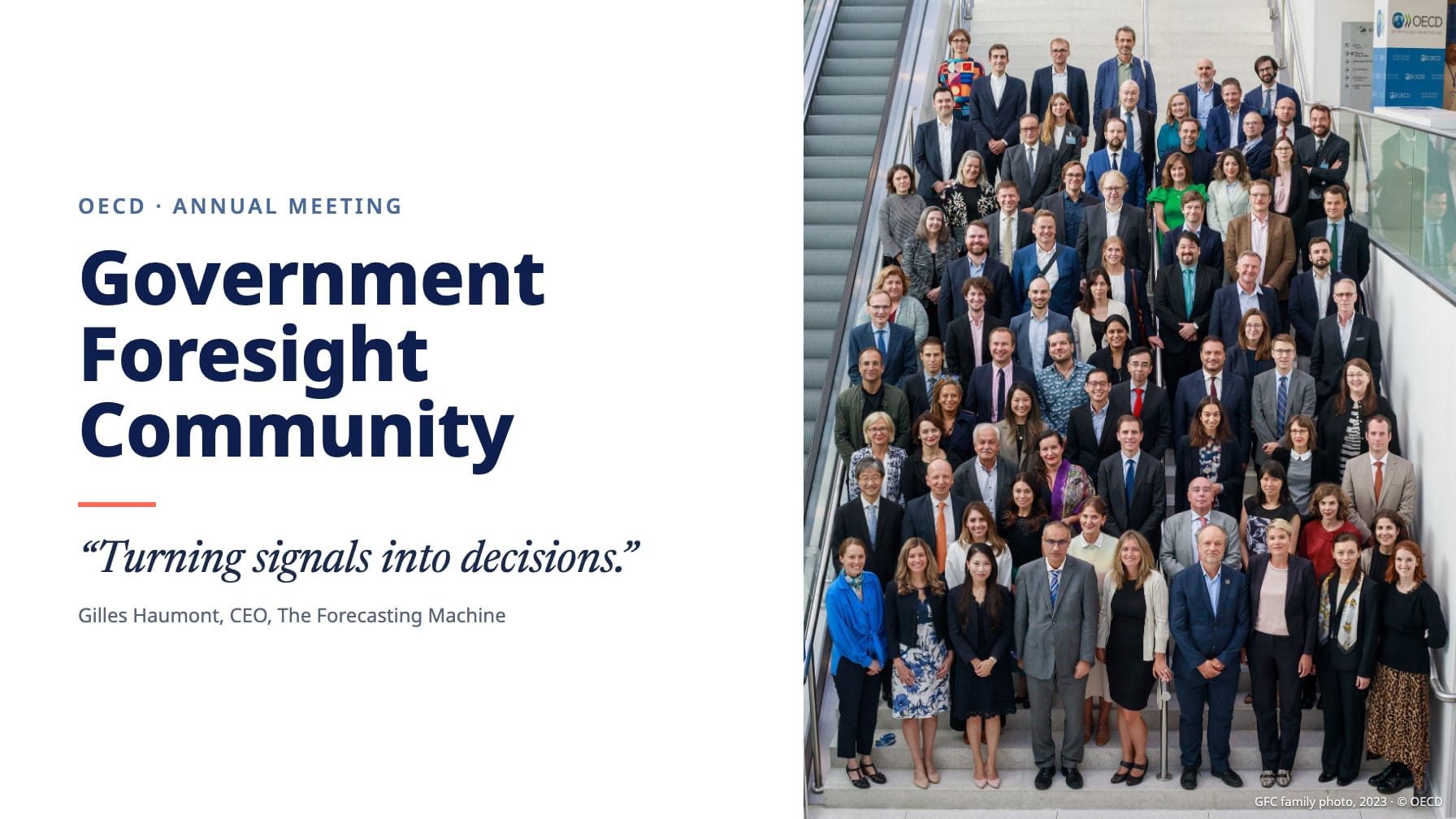 The OECD Government Foresight Community’s 2023 family photo of members on a staircase at the OECD, beside the network’s name and Gilles Haumont’s line “Turning signals into decisions.”